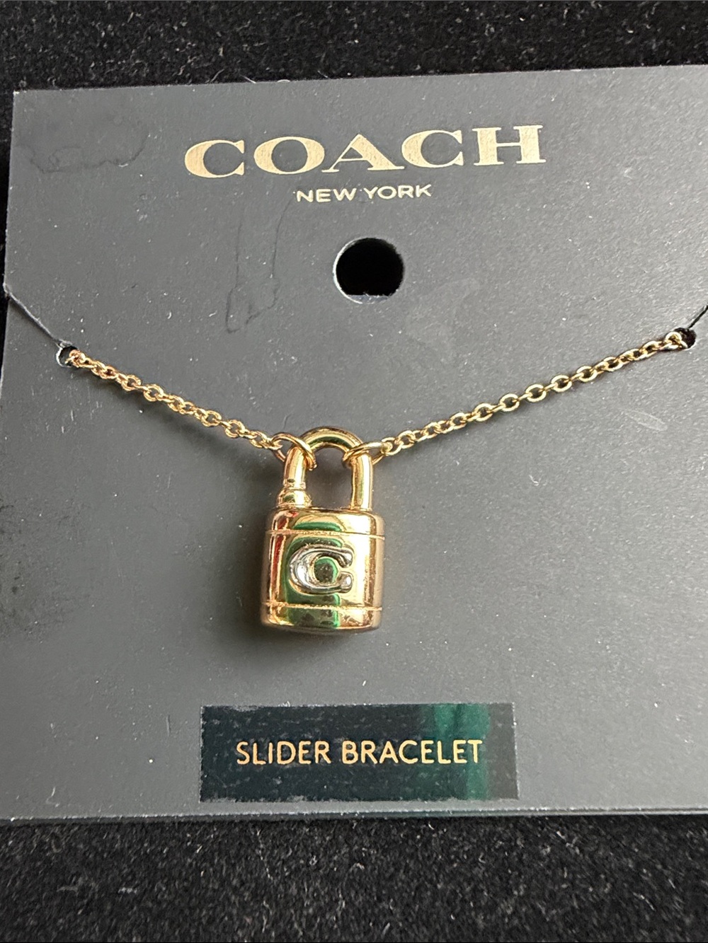 COACH Gold Padlock Charm Bracelet